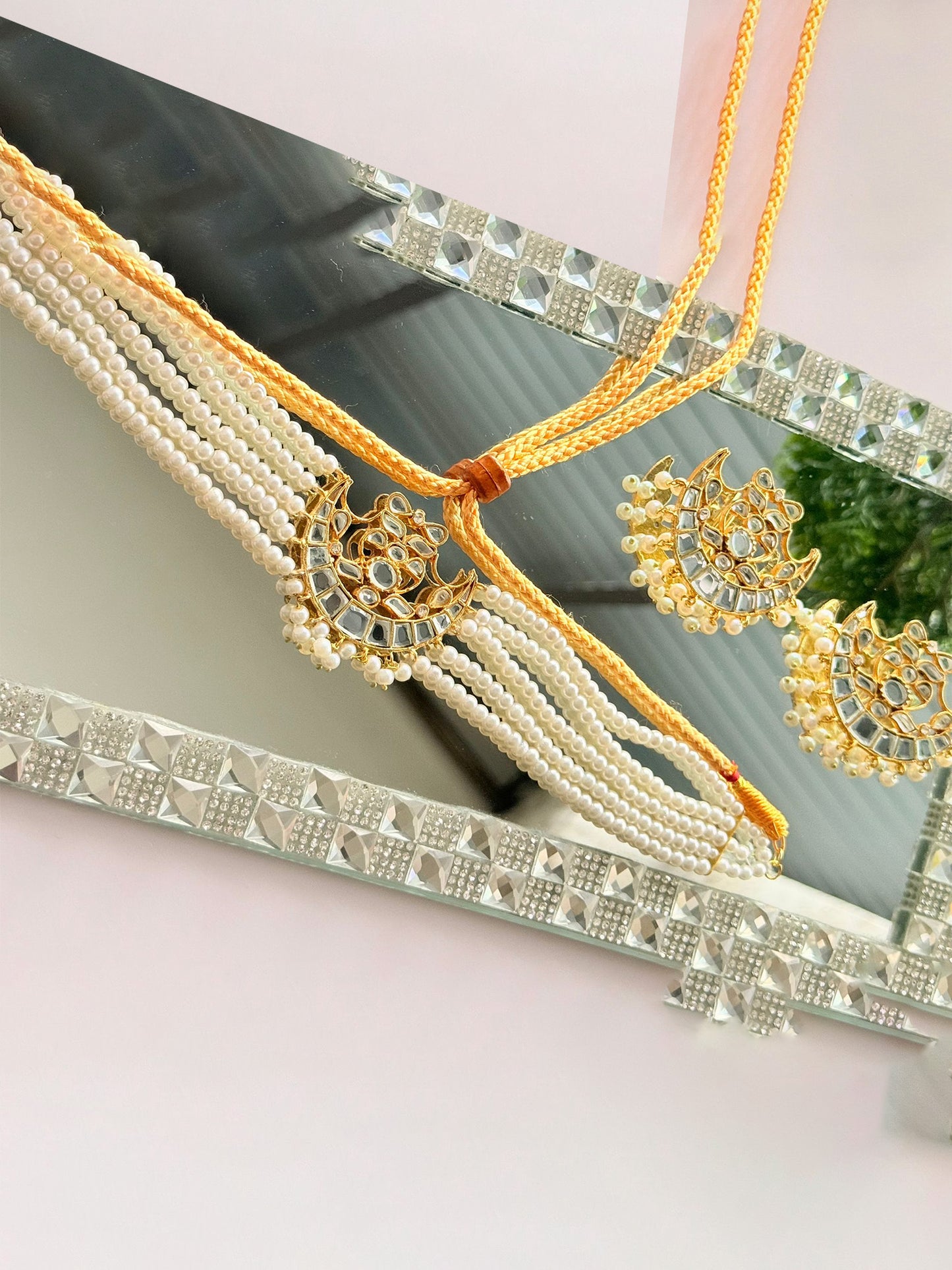 Elegant Noor E Ishq chand set featuring intricate embroidery on traditional fabric for festive or special occasions.