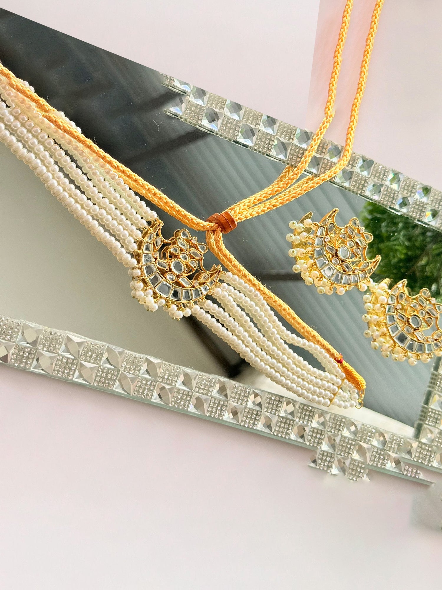 Elegant Noor E Ishq chand set featuring intricate embroidery on traditional fabric for festive or special occasions.